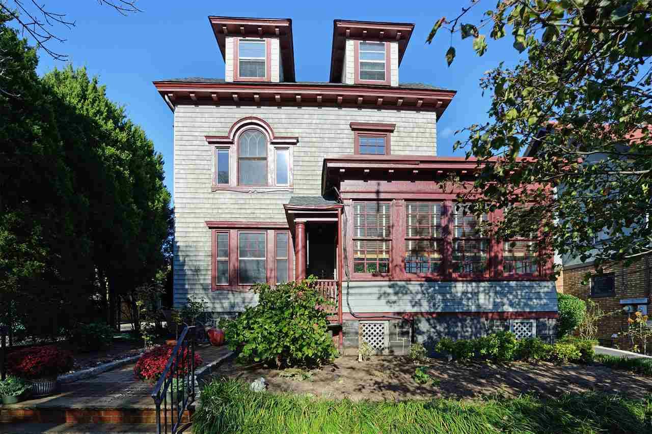 Welcome to this historic Weehawken home on 50 x 100 lot with gorgeous period details