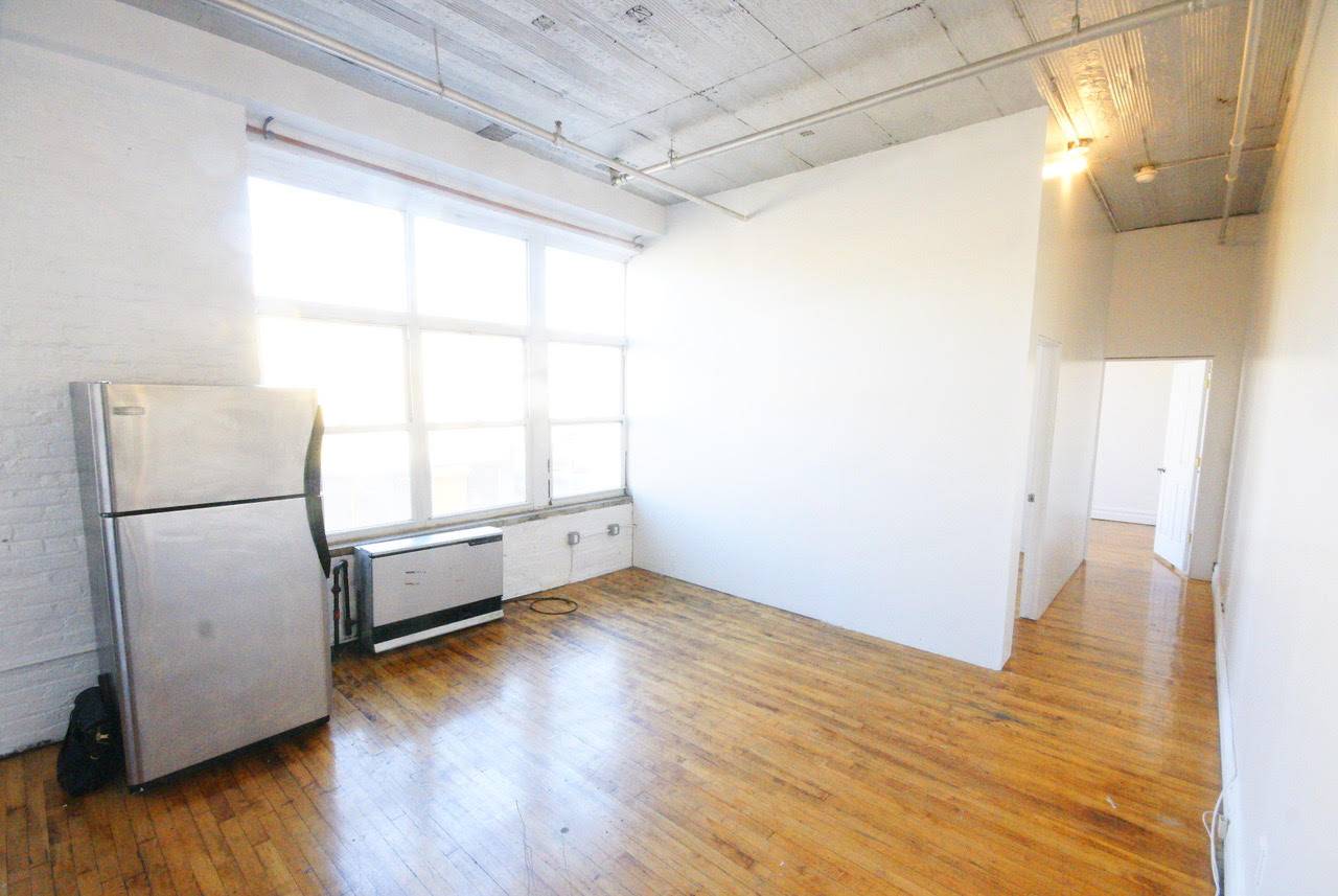 Stunning Bushwick NO FEE Loft with Spacious Living Room and High Ceilings