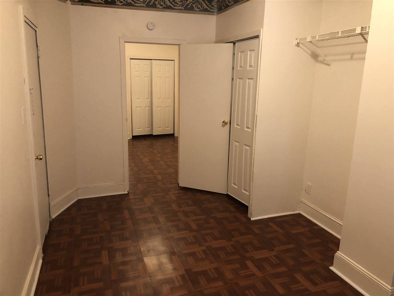 Newly renovated railroad two bedroom (walk through one room to get to next) in a prime location in JC Heights
