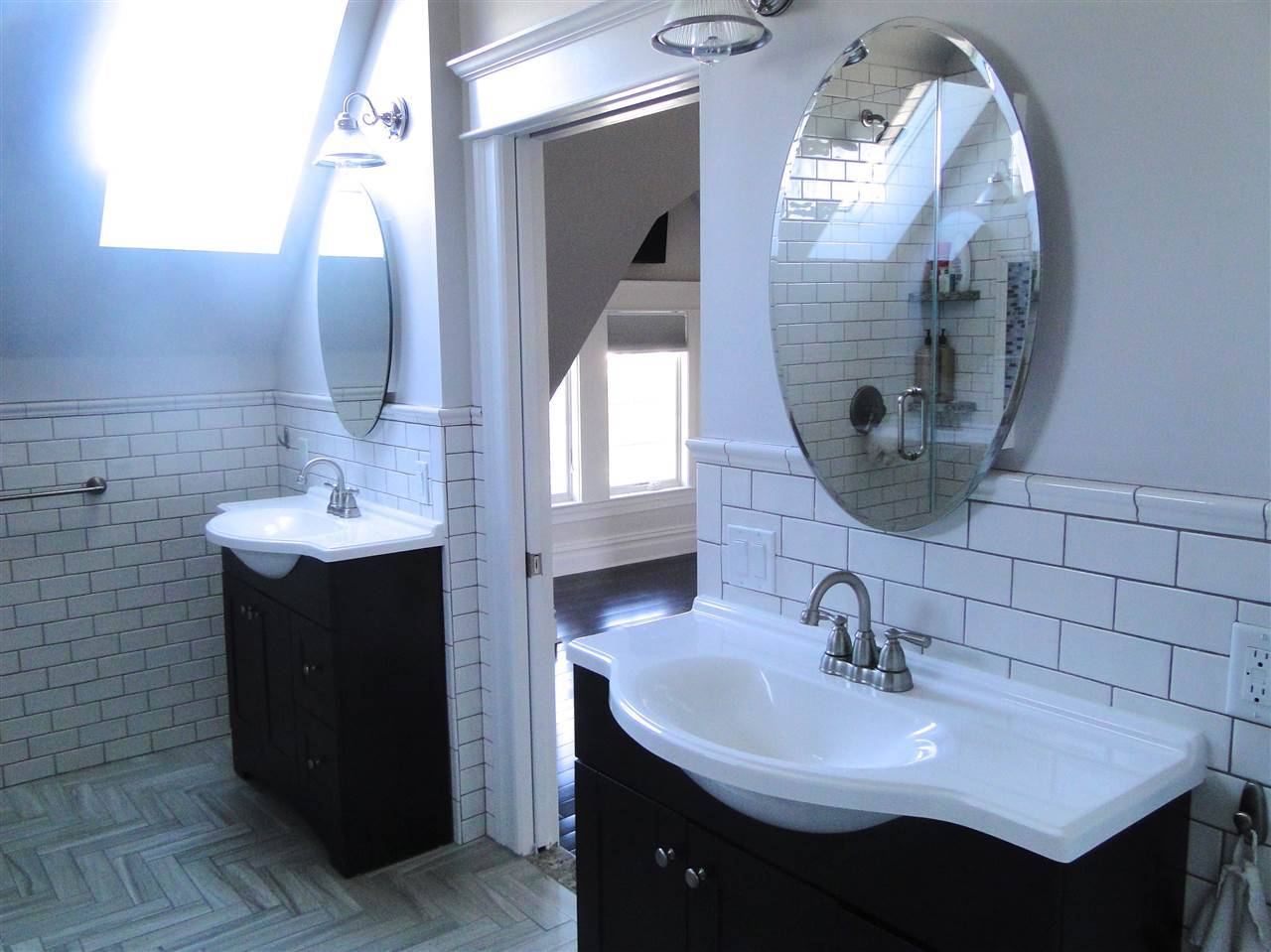 Welcome to this totally remodeled and renovated Center Hall Colonial in Rutherford