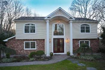 Luxurious Hamptons Style Colonial with Open Floor Plan