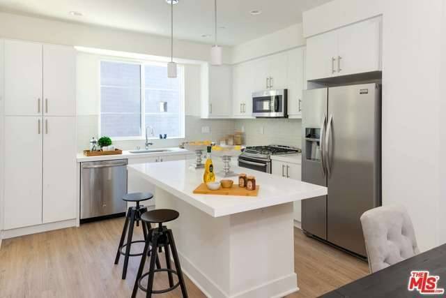 BRAND NEW distinct single-family residence