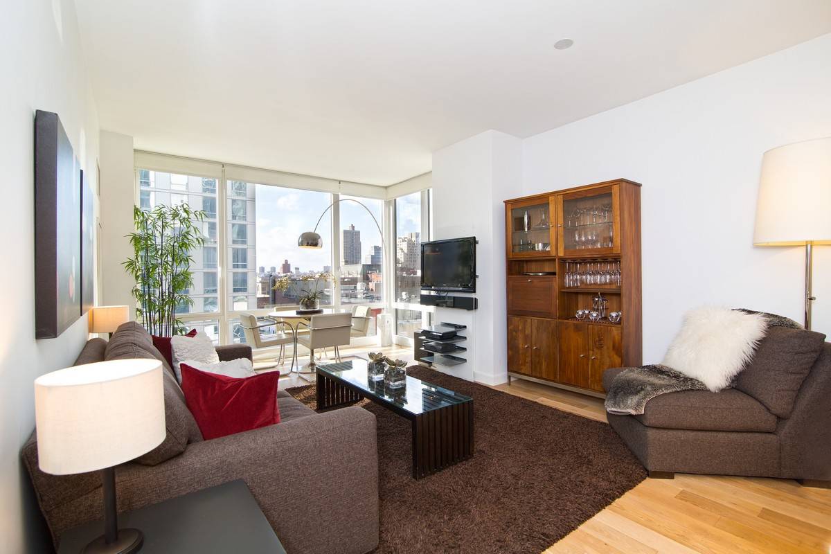 Spacious 1 bedroom, 1.5 bath corner condo in the heart of Theater District