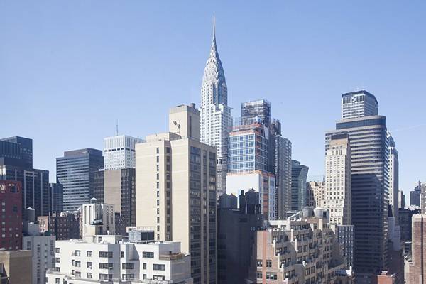 Midtown East Convertible Two Bedroom Apartment with Iconic City Views -  Near Grand Central and United Nations - Many Others Available - Call for Showings!