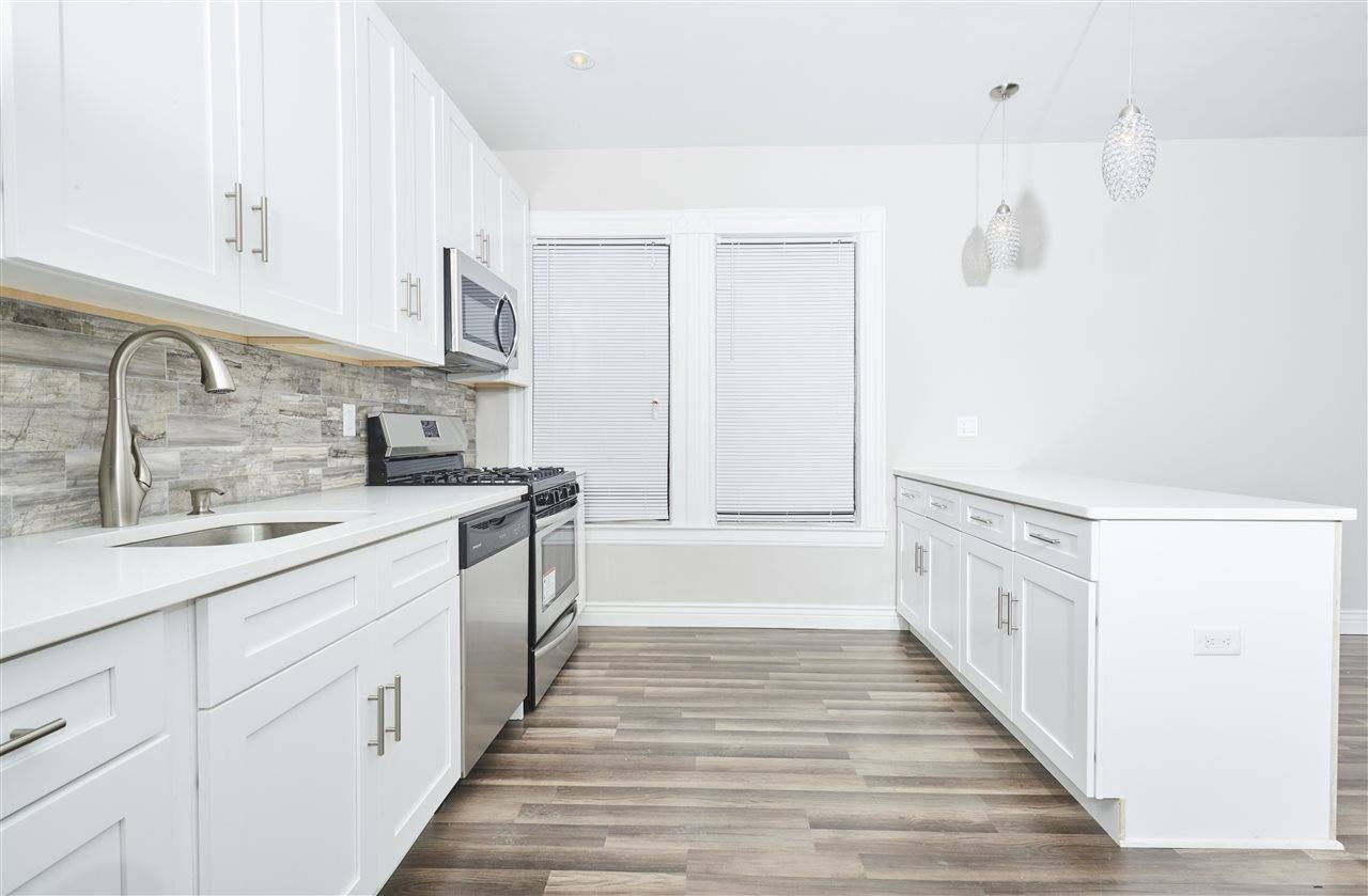 Be the first to live in this gut renovated home just steps to Lincoln Park and a short commute to the Journal Square PATH