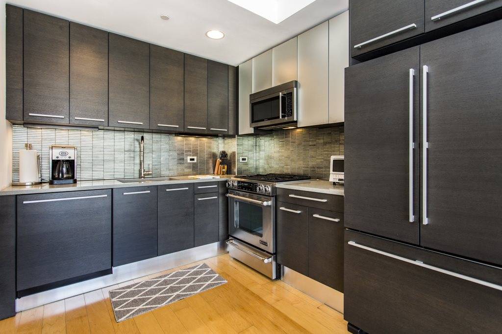 Situated in the coveted Crystal Point building in the heart of Downtown Jersey City