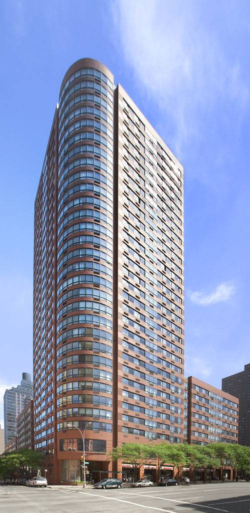 Upper East Side. Luxury 2 bedroom. Floor-to-ceiling windows. Marble accented bathrooms. Modern finishes. HUGE Bright space. Rooftop sun deck. Granite countertops. Beautiful views! 24-hour doorman/concierge - $3,395/month
