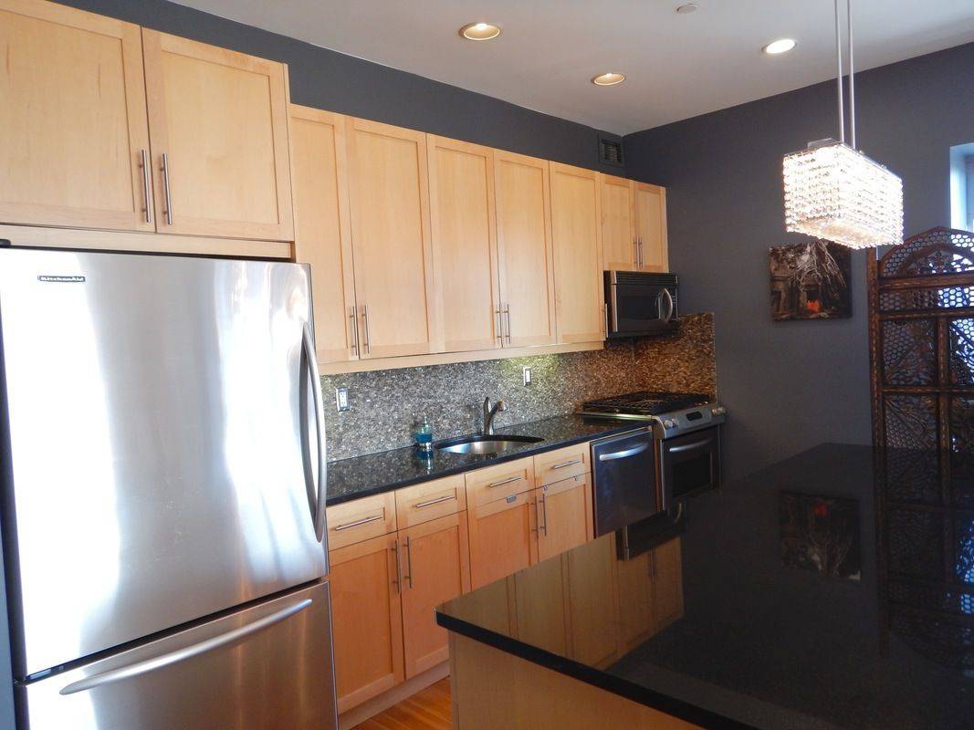 RARELY AVAILABLE CONVERTED WAREHOUSE LOFT CONDOMINIUM IN SOUTH HARLEM WITH 15-YEAR TAX ABATEMENT!STEPS FROM CENTRAL PARK,MORNING SIDE PARK,