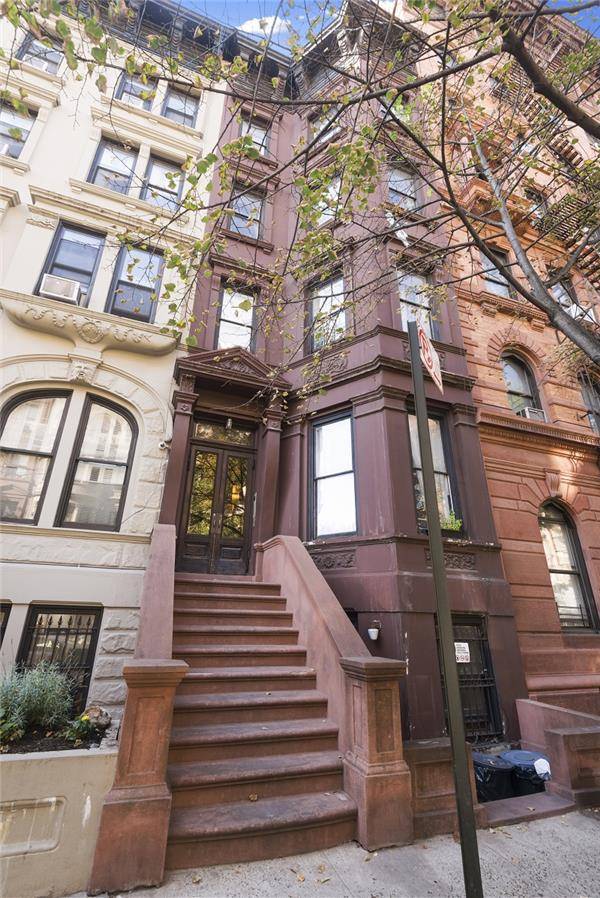 This handsome five story townhouse is located on one of the most desirable blocks on the Upper West Side.