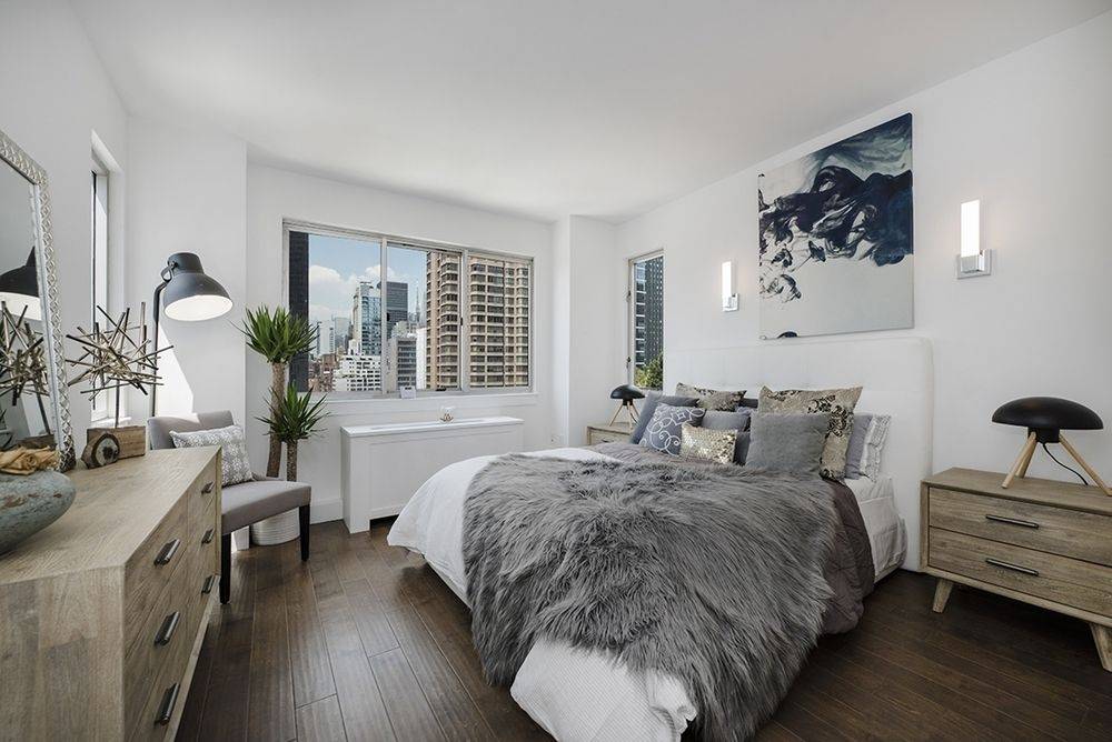 Spacious 2 Bed - 2 Bath..Located in Midtown East..Stunning Manhattan Skyline Views