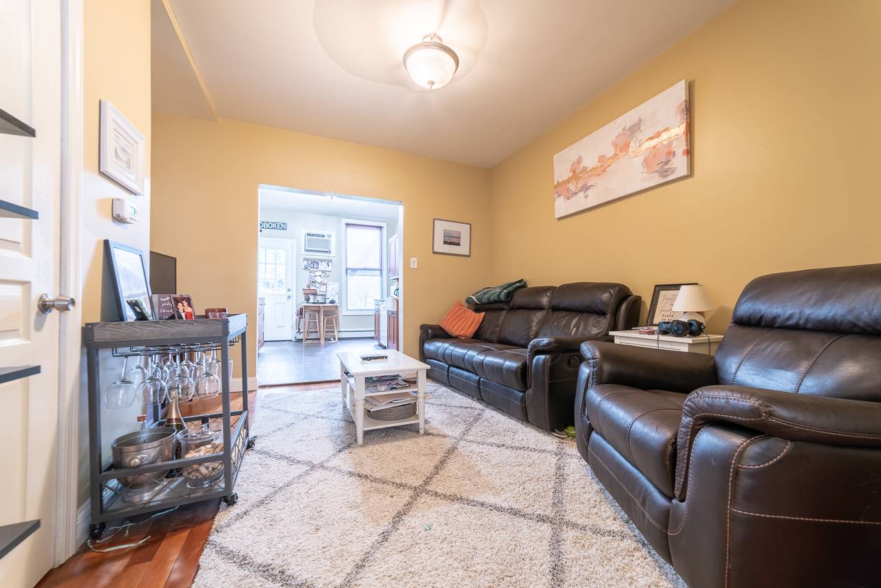 Floor-Thru Parlor Level 1BR Apartment In Downtown Hoboken!  Laundry on Site! Private Backyard!