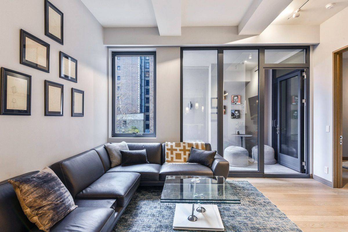 Striking Loft-like One Bedroom - New Development - Private Terrace - Prime Nomad Location - Full Service Building