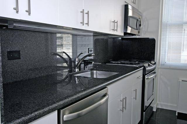 Sprawling Newly Renovated 3 Bedrooms 3.5  Marble Baths, in Midtown East. ALL NEW Granite Eat-in Kitchen, and Wood Parquet Floors, Excellent Views! 24 Hour Doorman Building.