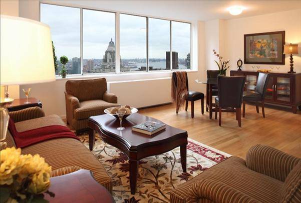 Lovely 2 Bedrooms, 2 Marble Baths with Glass Showers in Midtown East. Euro-style Kitchens with Granite Counter tops, Premium Appliances, and Custom Closets.