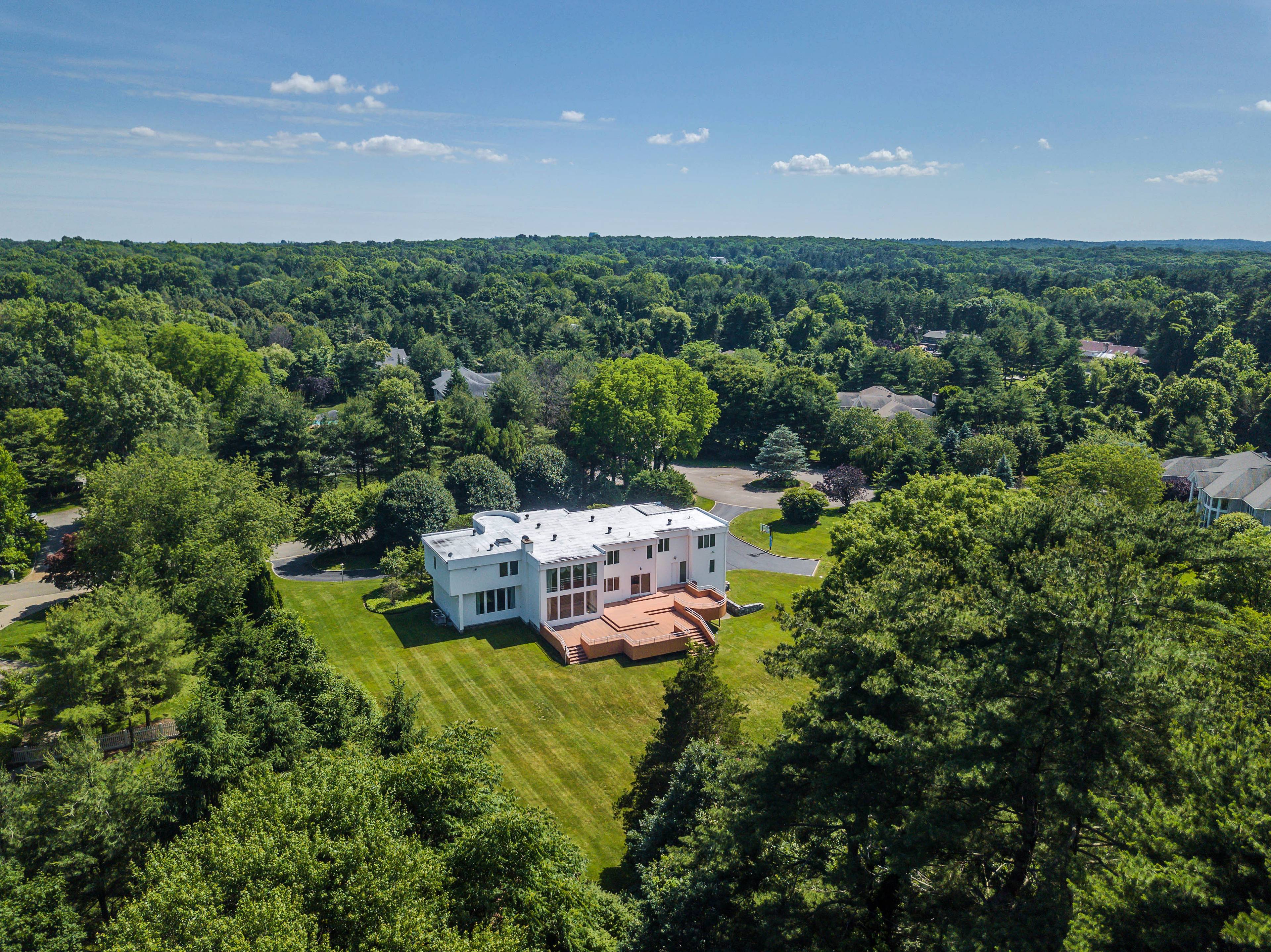 Incredible 6,600 Sq Ft Contemporary Located On The Cul De Sac Of One Of Oyster Bay Cove's Most Sought After Streets