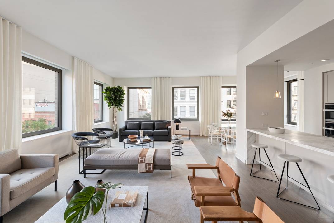 116 UNIVERSITY: A New Village Landmark