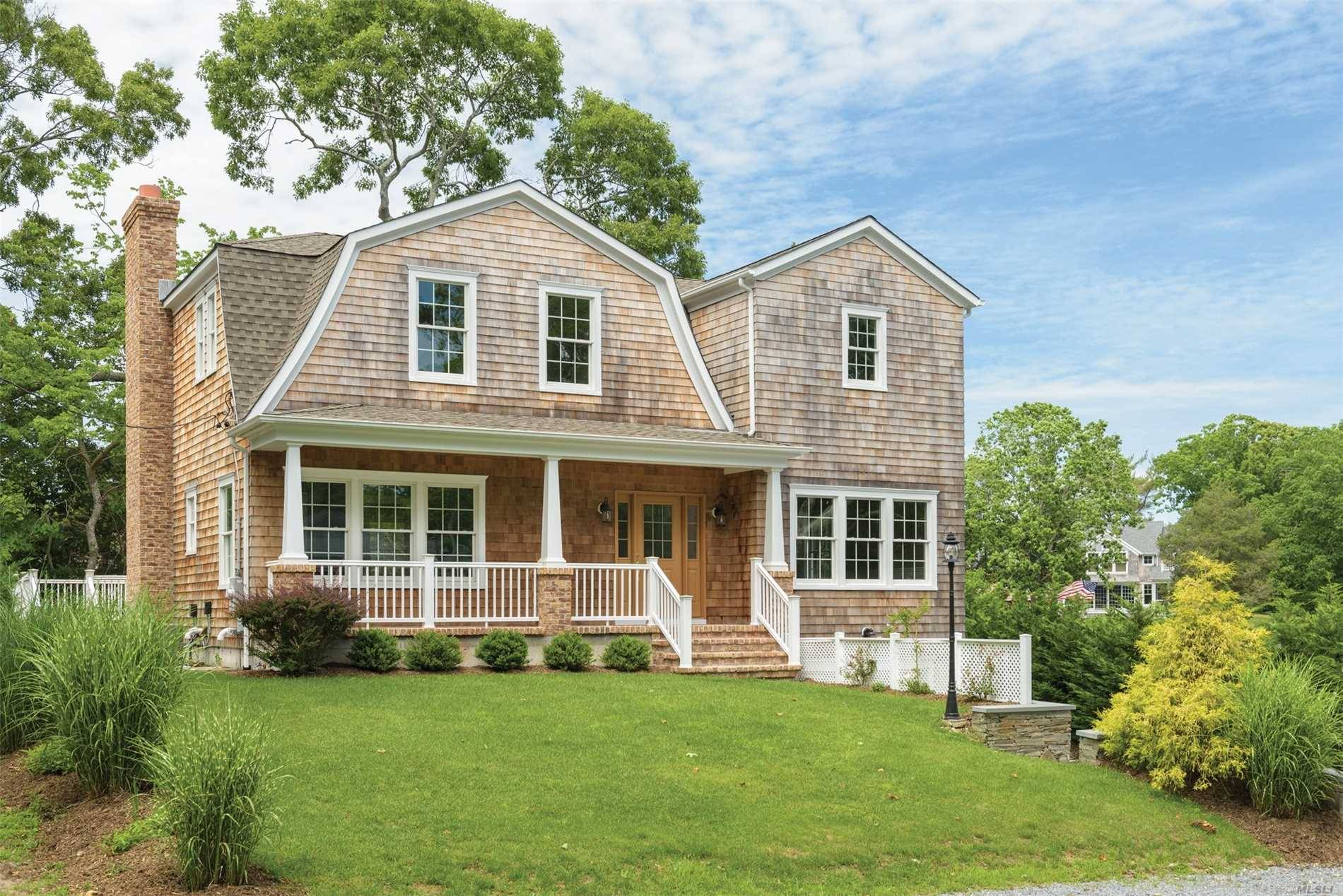 Traditional grace added to an open floor plan creates a very special experience in a coveted location.