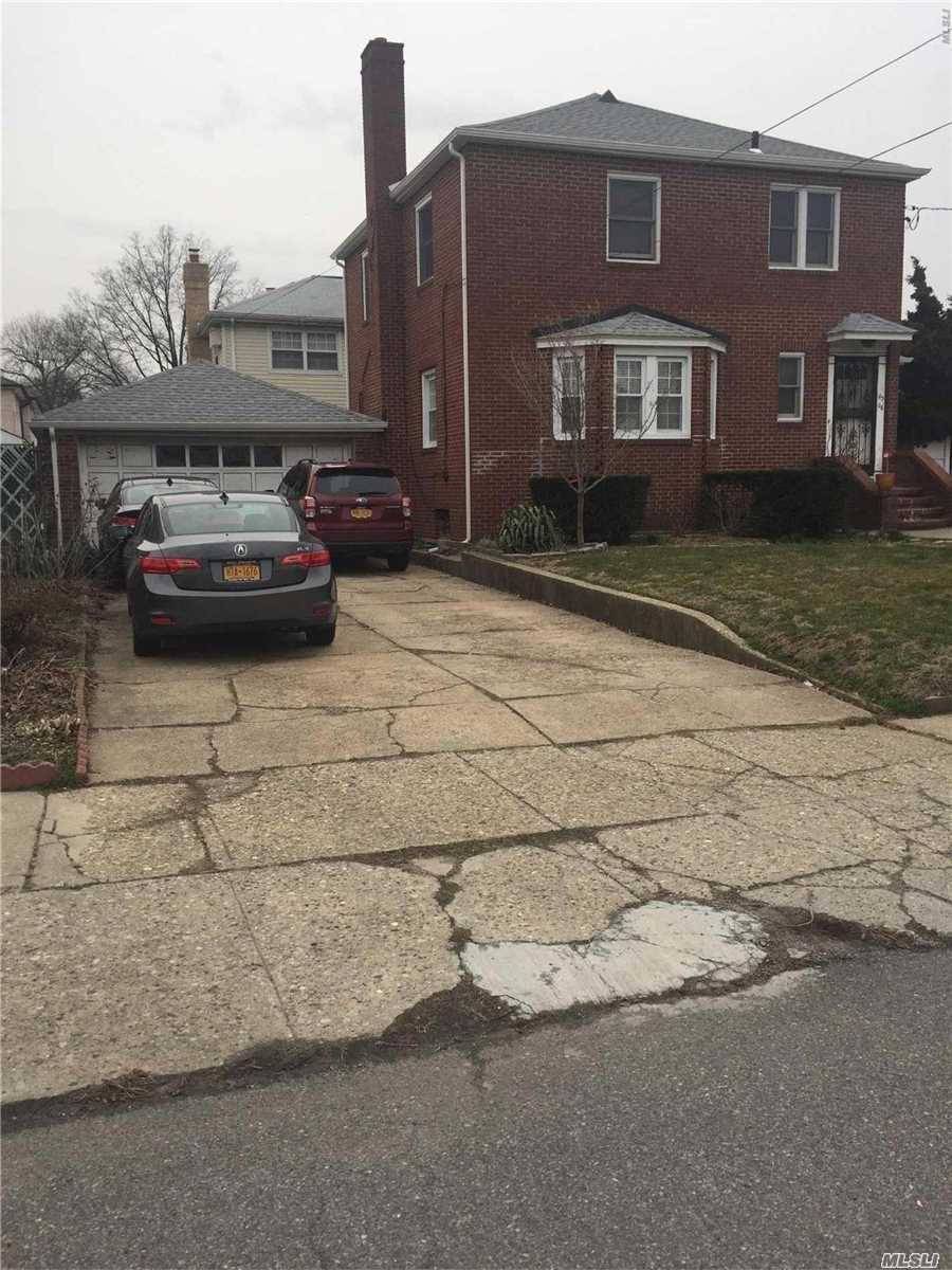 Legal Two Family House being used as One Family House Large corner property Irregular, One part of the property is 100 by 67 by 65.