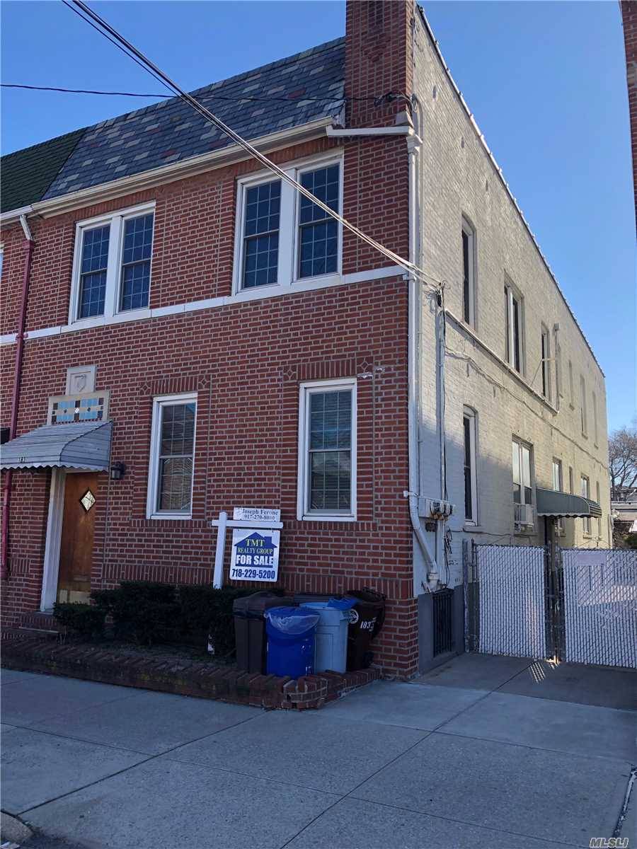 Beautiful Brick semi attached 3 family with private driveway in Kensington.