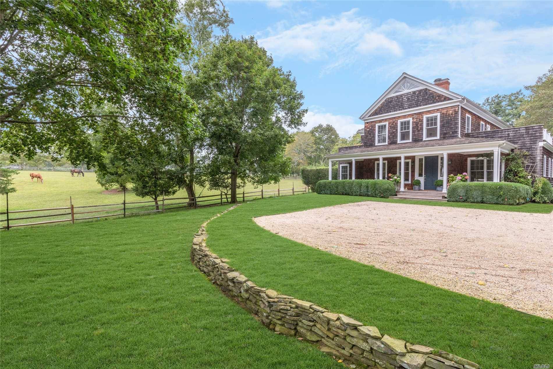 Published in the New York Times, this exquisite country retreat overlooks acres of farmland in Southampton North estate area.