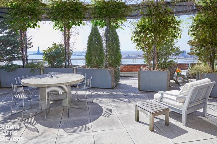 3, 200 square foot waterfront duplex with unobstructed harbor and city views from four private terraces.