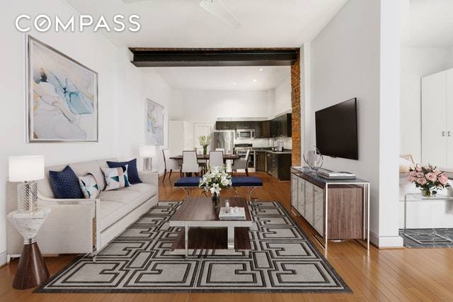 Occupying the parlor floor of this Chelsea townhouse is a unique loft like one bedroom with 12 foot ceilings and a private terrace.