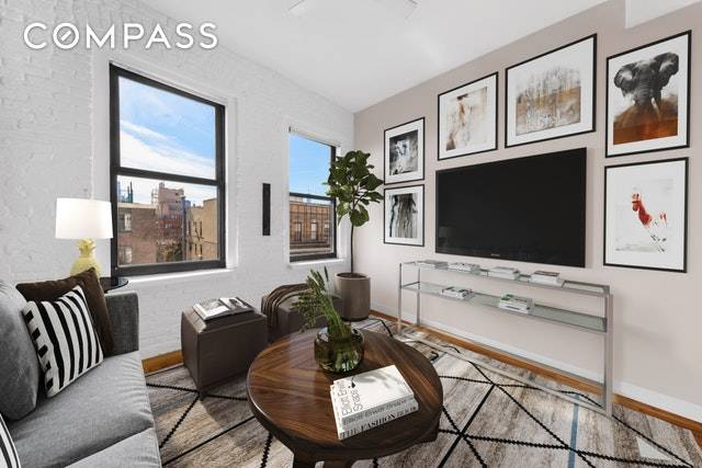 This unique East Village 1 2 bedroom duplex home with a private roof deck is located on the top two floors of a pre war walk up building on a ...