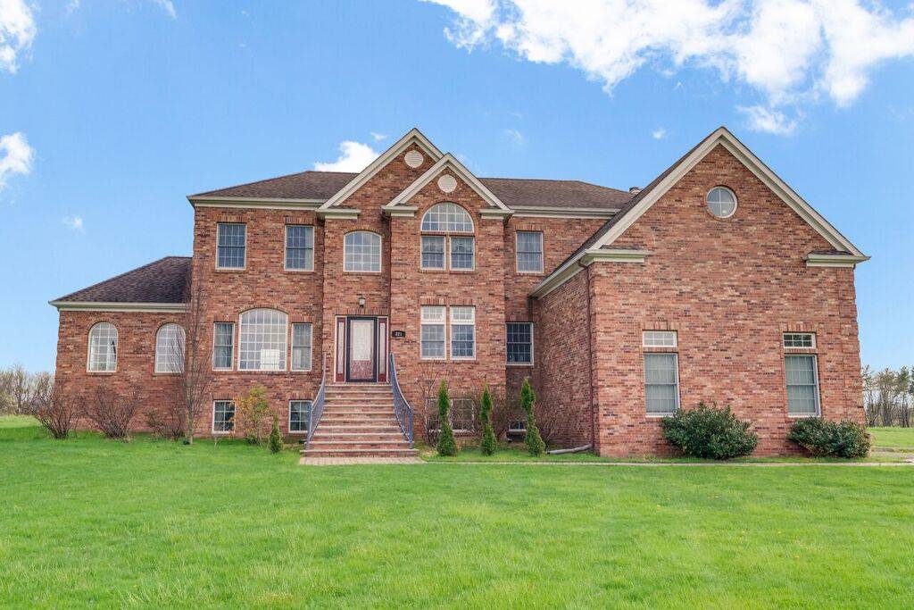 This stunning Custom Home is A MUST SEE