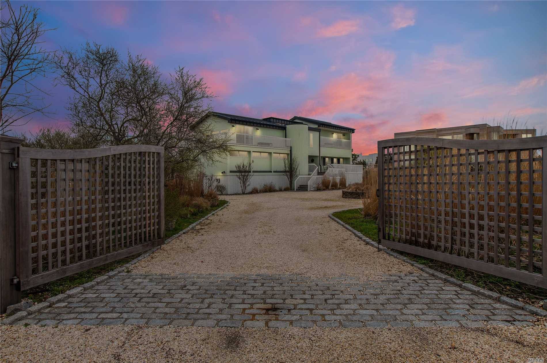 One of a kind Beach House on a quiet street off Dune Road.