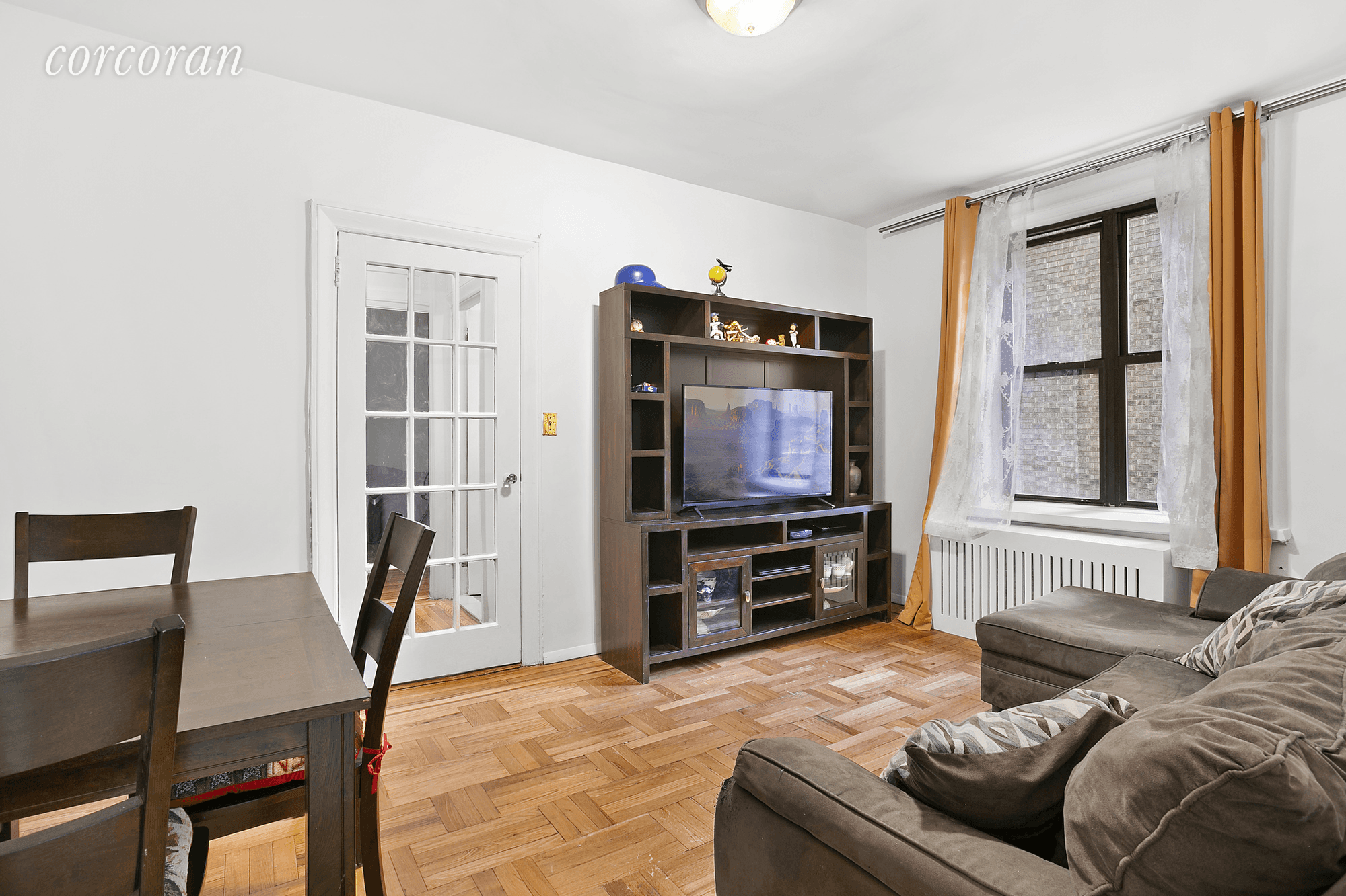 Elevated, first level, one bedroom co op apartment overlooking the garden courtyard.
