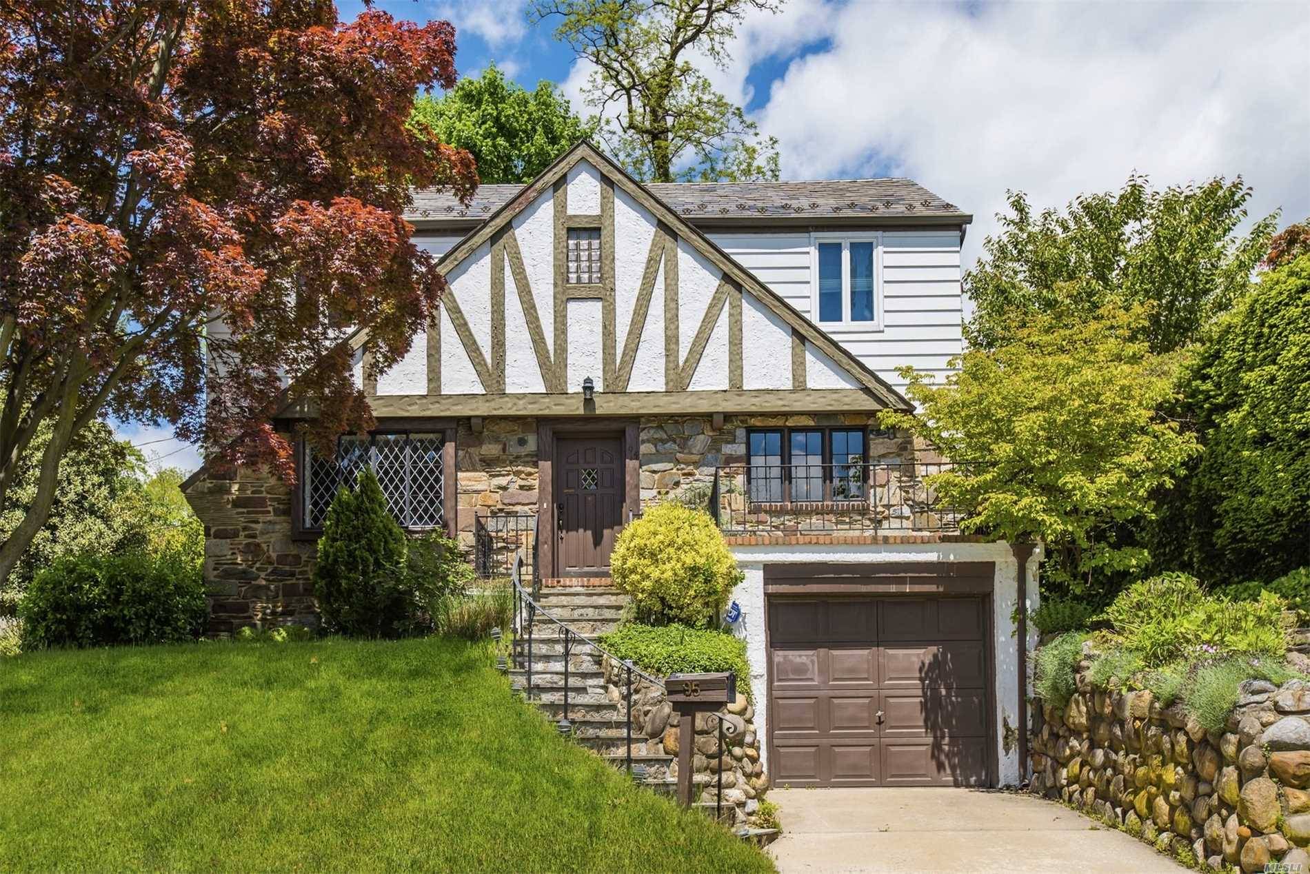 Another Price Reduction. Charming English Tudor featuring living room w fpl, formal dining room, eat in kitchen and powder room on main floor.