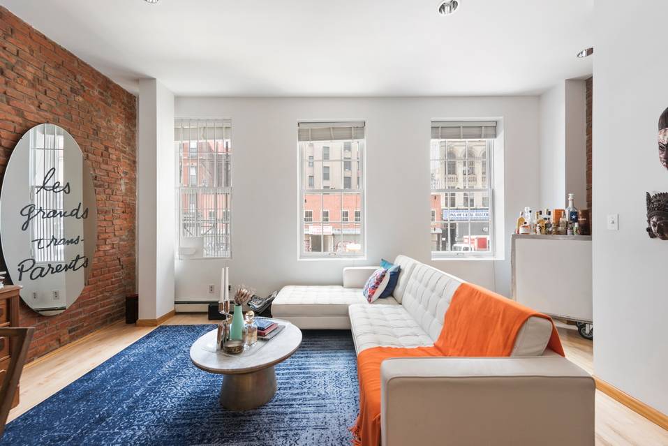 Stylish Soho Duplex Loft with Exposed Brick, 1 Bed + Large Den + 2 Baths