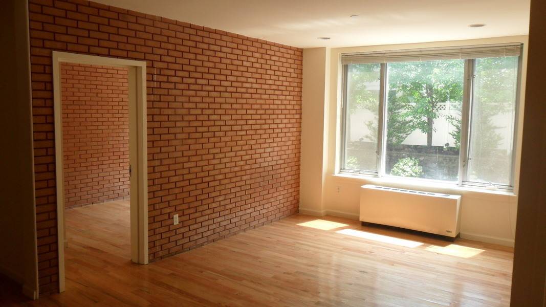 East Village LUXURY LIVING...2 BEDROOM/FLEX 3...2 BATHROOM..EXPOSED BRICK..BRAND NEW..
