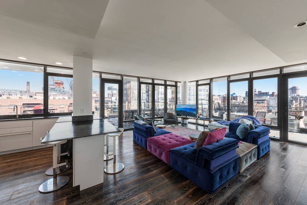 FURNISHED RENTAL AT THE OOSTEN WITH MASSIVE OUTDOOR CORNER TERRACE !