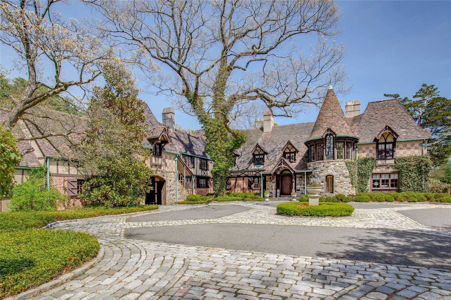 FRENCH NORMANDY MANOR HOME, 7 ACRES, FORMAL GARDENS, 7 BDRMS, 9 BATHS, FLR LIMESTONE FLRS FPLC, FDR FPLC, LIBRARY, BILLARD RM, CUSTOM EIK GLASS SLATE COUNTERS 3 DISHWASHERS, WOLF DBL ...