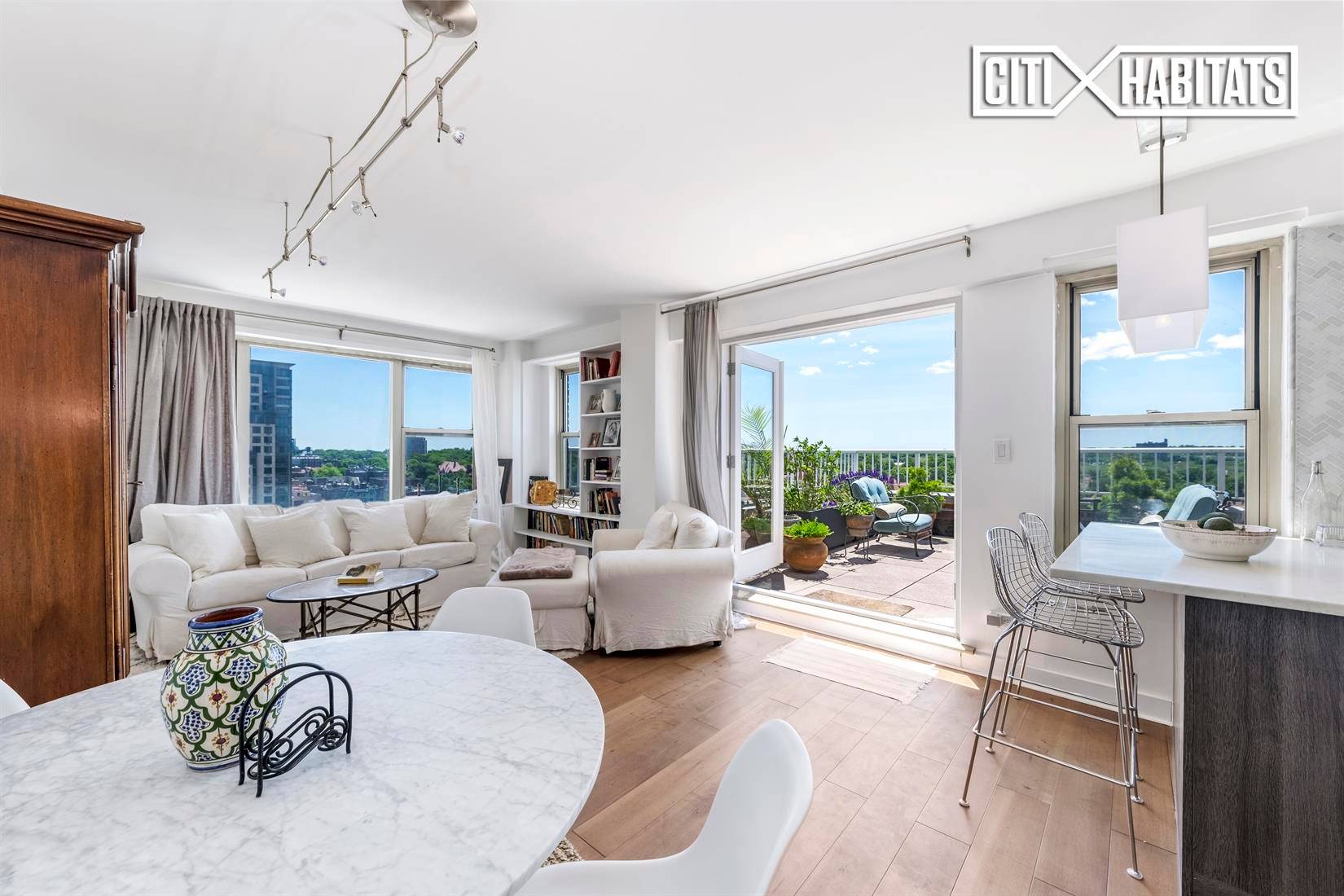 OFFER ACCEPTED. The sophistication and designer finish of a Manhattan penthouse combined with the charm and serenity of Forest Hills !