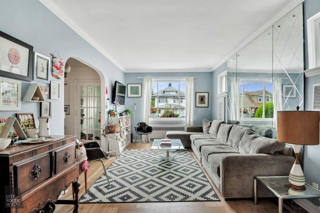 In the heart of Marine Park, you'll find this charming brick tudor style house with all of the modern amenities you need.