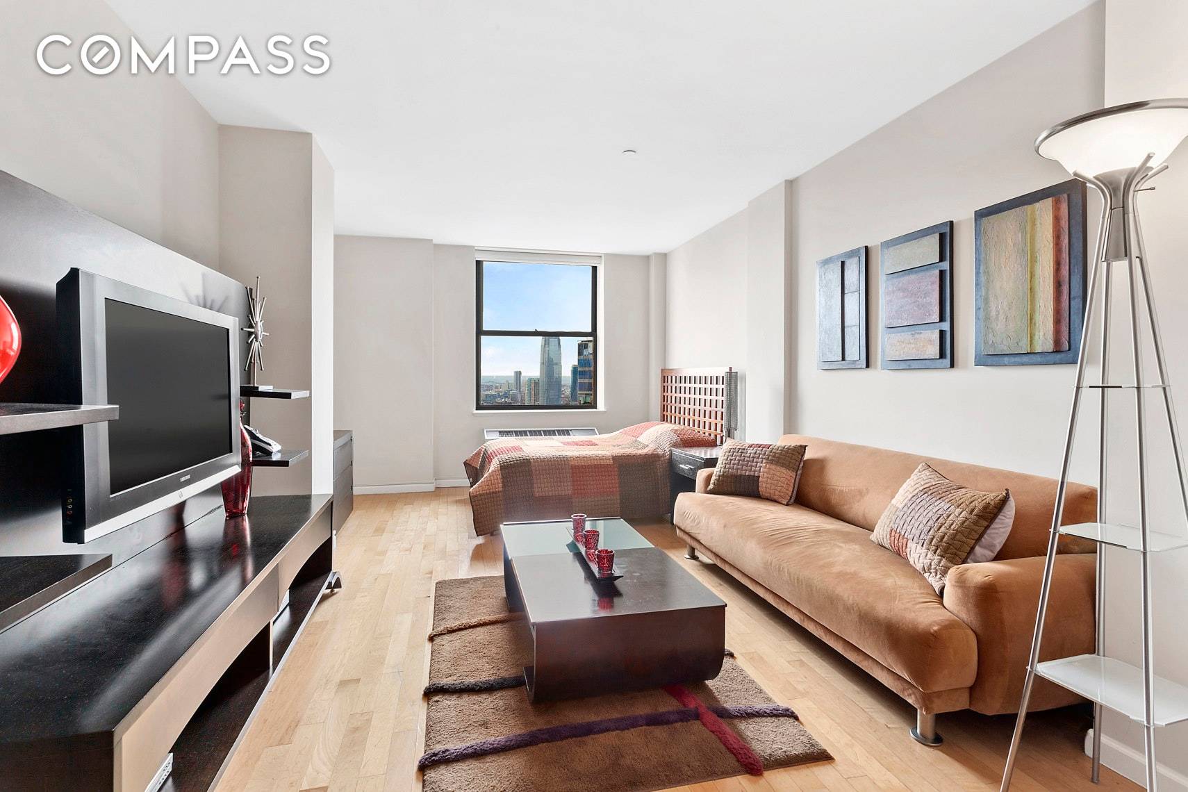 Fabulous high floor 35th loft style Studio at the Downtown Club Condominium.