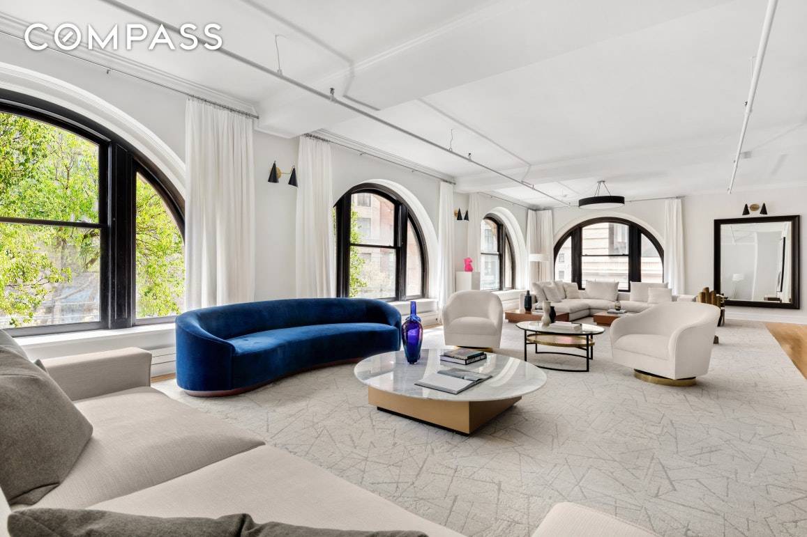 With almost 45 feet of south west facing, sunny frontage overlooking Tribeca Park with its majestic London Plane trees, this centrally located authentic 5 bedroom loft with massive arched windows ...