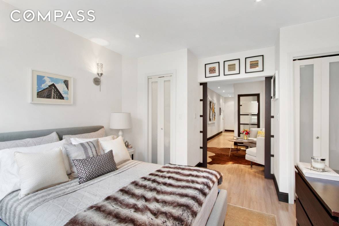 Walk up two quick flights to this third floor renovated and bright designer one bedroom in the heart of Hell s Kitchen.