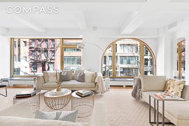 A palatial home in the midst of New York s most dynamic neighborhood awaits.