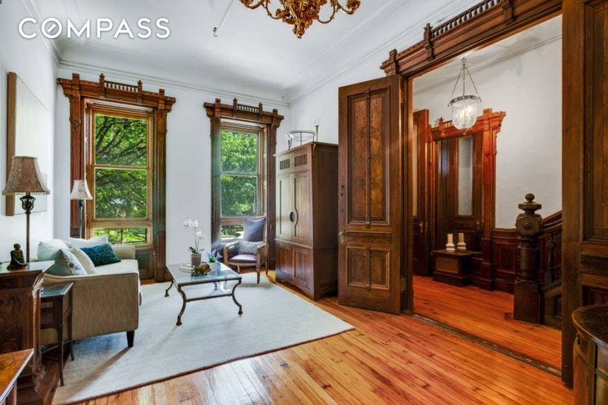 Built in the Early 1900 s, this architecturally distinctive townhome is a rare find.