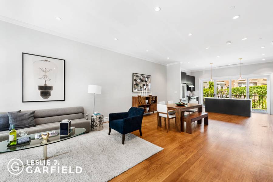 45 Halsey Street is a mint condition, 20' wide townhouse finished in an elegant classic contemporary style.