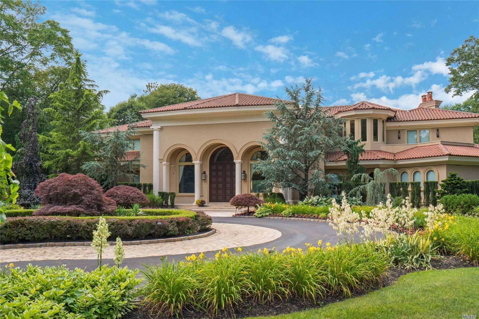 This Quintessential five acre Gold Coast Estate is a Stunning Interpretation of Mediterranean Architecture.
