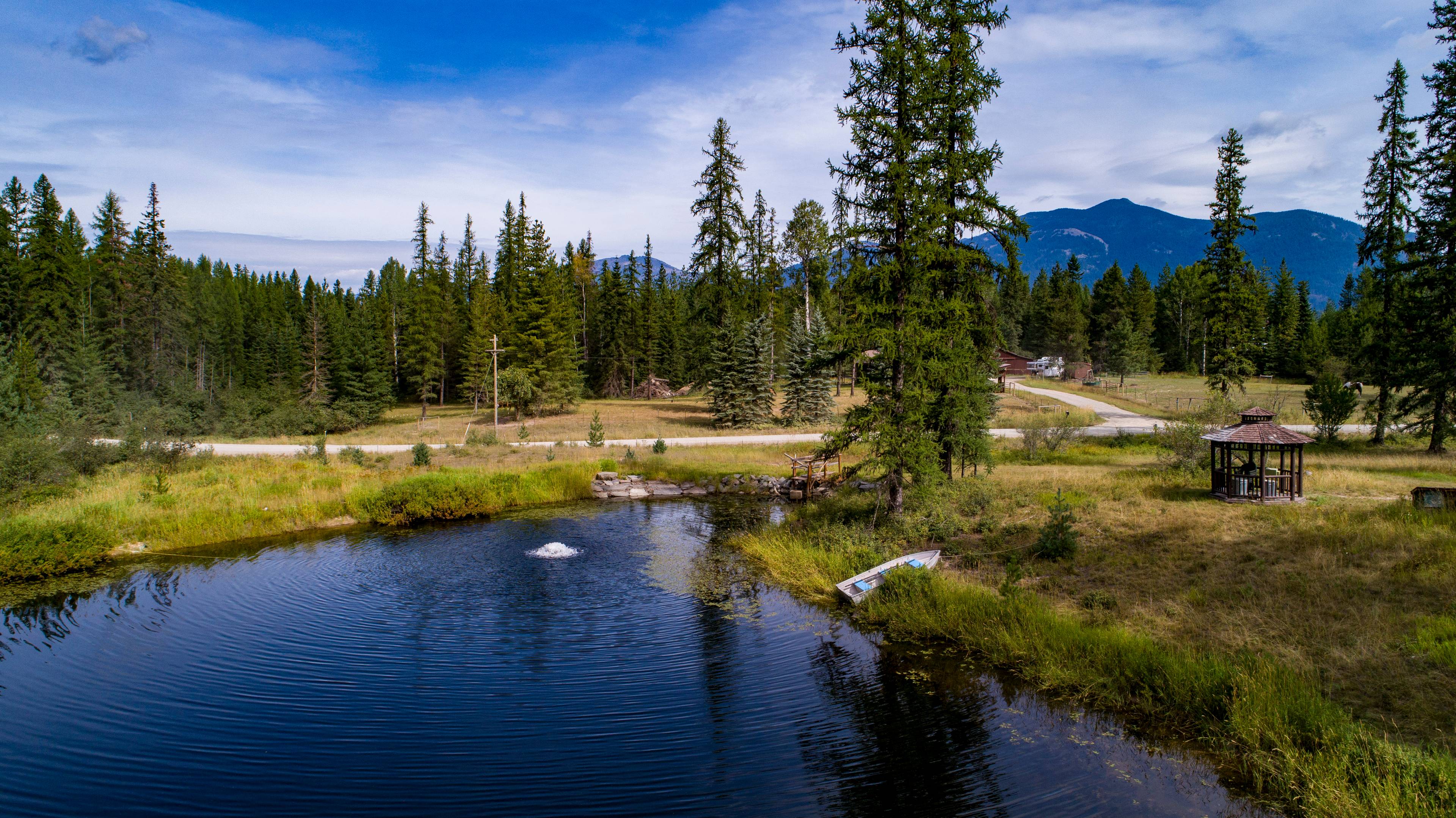 Exclusive 80 Acre Paradise with 2br Ranch House and Barn in Pristine Montana Countryside.