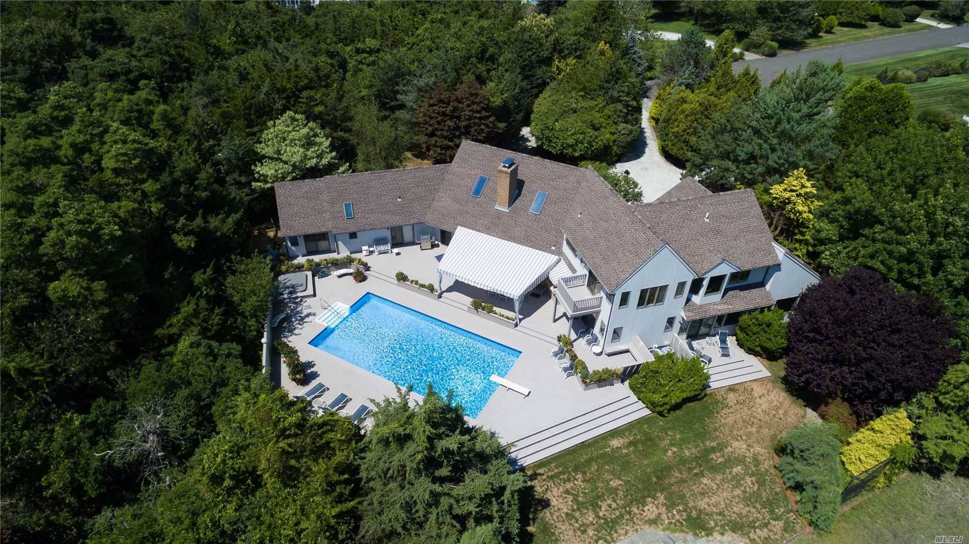 Spectacular 3 plus acre Bayfront property with over 200ft of water frontage.