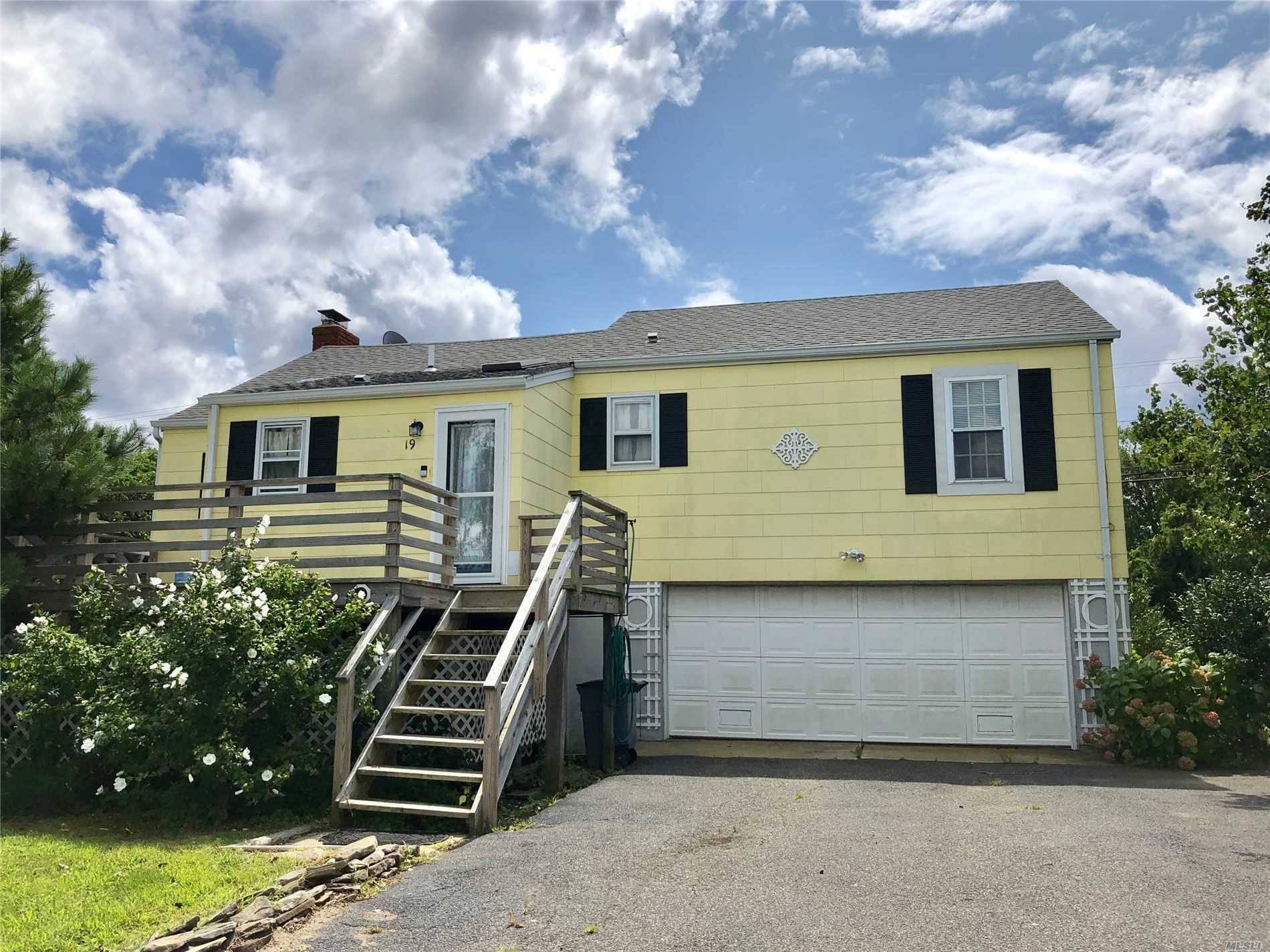 Water Views ! Bright and Sunny Spacious Open Floor Plan with Wood Burning Fireplace !