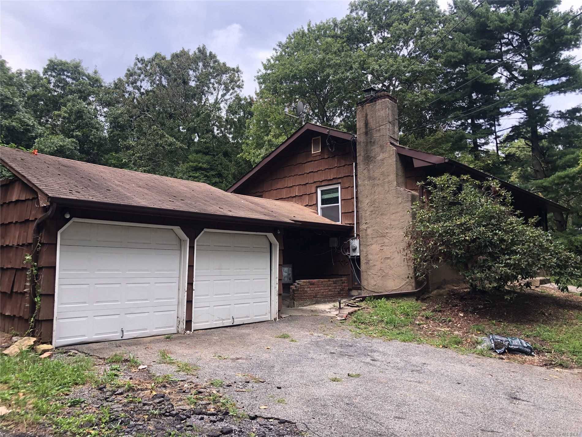 Opportunity Awaits ! 3 Bedrooms, 2 fireplaces, 2 Car Garage on 1.