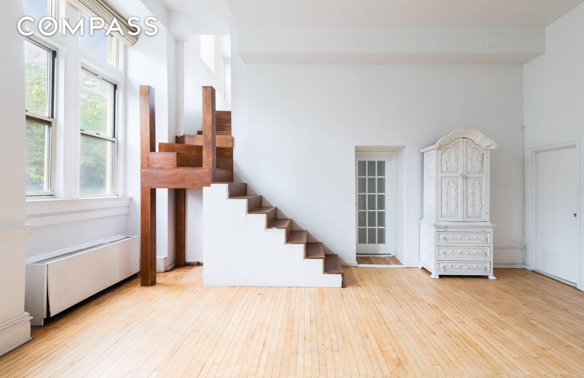 Original 1406 sq ft 3 bedroom 2 bath apartment with PARKING at the Cobble Hill School Condominium, a land marked former schoolhouse.