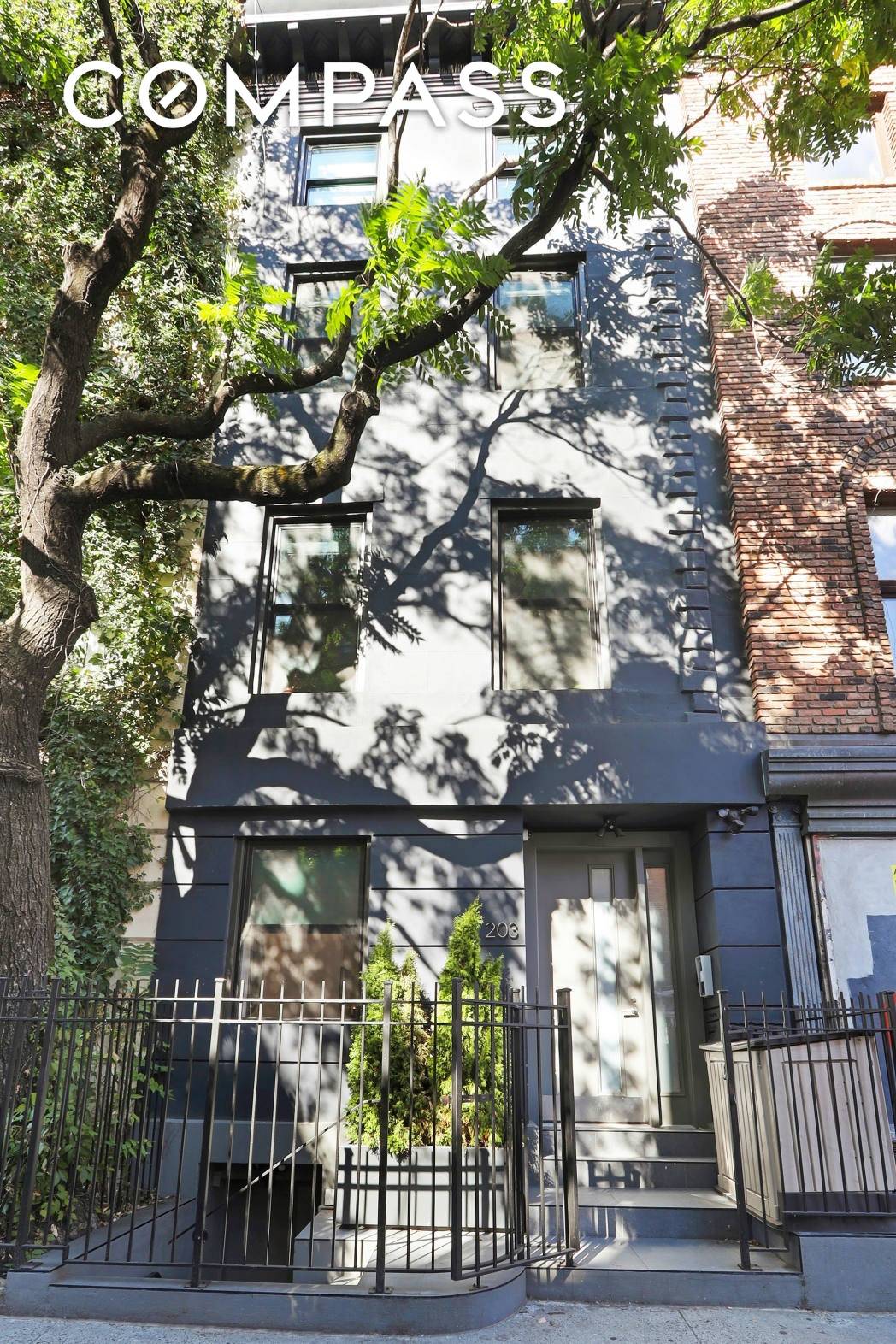 Bring your Contractor This 4 unit Townhouse boasts great location, original hardwood floor, high ceilings, sky lights, brick exposure and potential to expand.